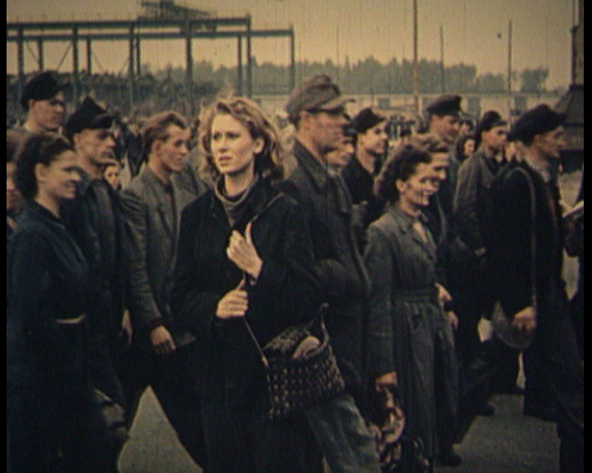WORKERS LEAVING THE FACTORY